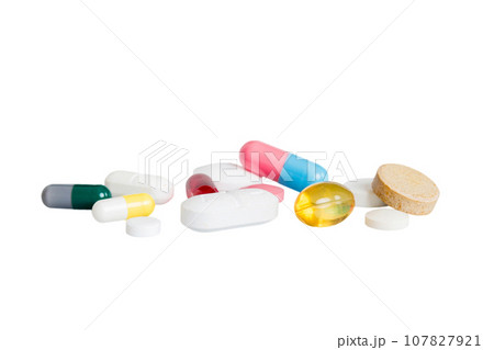 Many different colorful medication and pills perspective view. Set of many pills on colored background Many different colorful medication and pills perspective view. Set of many pills on colored background 107827921