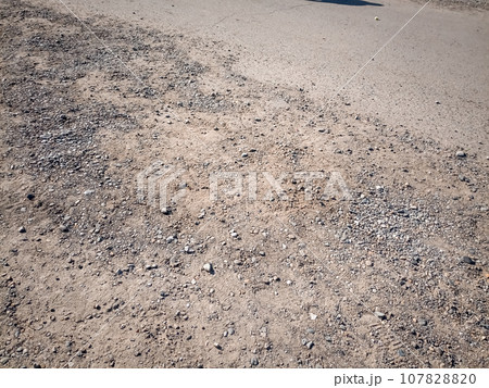 Rubble on the side of the road. Rubble on the side of the road. 107828820
