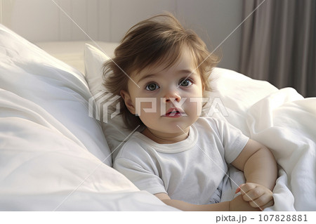 The concept of childhood. Portrait of black baby with afro hair. 107828881