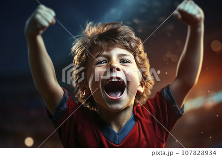 Soccer boy. Little goalkeeper is celebrating after successful football match. 107828934