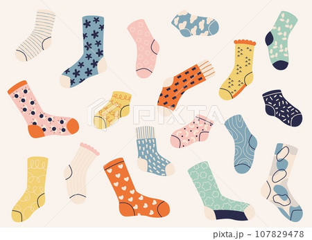 Socks collection. Warm winter woolen foot wear, funny fashion knitted cotton dotted socks, trendy fashion doodle textile foot wear. Vector isolated set Socks collection. Warm winter woolen foot wear, funny fashion knitted cotton dotted socks, trendy fashion doodle textile foot wear. Vector isolated set 107829478