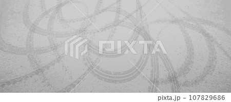 Top view loop-shaped round tire tracks on a gray road Top view loop-shaped round tire tracks on a gray road 107829686