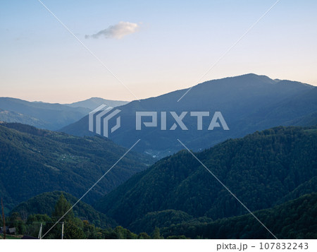 Village in Transcarpathia region scenic Carpathian mountains view Ukraine Europe Autumn countryside landscape Recreation 107832243