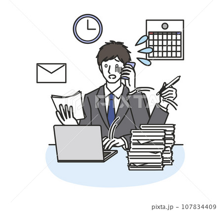 仕事に追われる男性社員 107834409