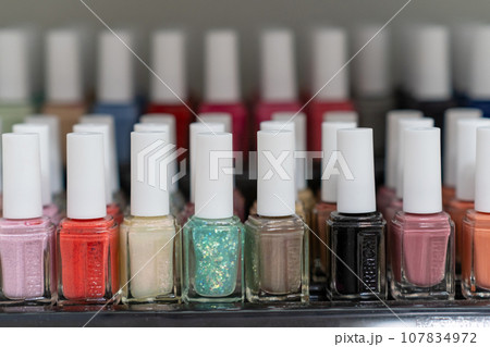 14.10.2023, Kemervo, Russia. Showcase with different nail polishes in a store window. Multi-colored nail polishes for buyer's choice. Beauty and nail care. 107834972