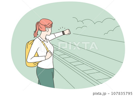Woman on platform experience train delay  107835795