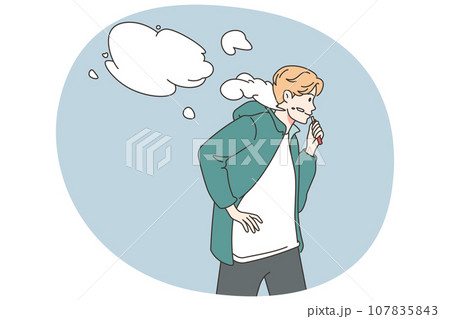 Young man smoking vaper outdoors 107835843