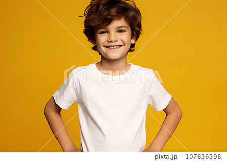 A Young Boy Flaunts His Look in a Bella Canvas White Shirt Mockup Against a Vibrant Yellow Background, the Ultimate T-Shirt Design Template and Print Presentation Mock-Up created with Generative AI 107836398