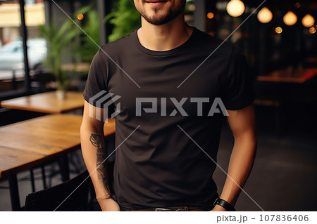 A Young Man Dons a Bella Canvas Black T-Shirt and Jeans, Enjoying a Relaxing Day at a Cozy Restaurant, Featuring a T-Shirt Design Template and Print Presentation Mockup. created with Generative AI 107836406