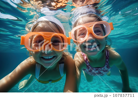 Two Young Children Wearing Swim Goggles Delight in Carefree Summer Fun, Creating Cherished Childhood Memories. created with Generative AI Two Young Children Wearing Swim Goggles Delight in Carefree Summer Fun, Creating Cherished Childhood Memories. created with Generative AI 107837711