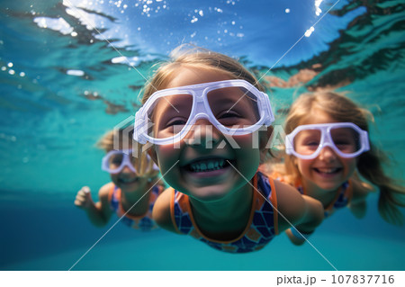 Two Young Children Wearing Swim Goggles Delight in Carefree Summer Fun, Creating Cherished Childhood Memories. created with Generative AI Two Young Children Wearing Swim Goggles Delight in Carefree Summer Fun, Creating Cherished Childhood Memories. created with Generative AI 107837716
