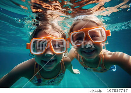 Two Young Children Wearing Swim Goggles Delight in Carefree Summer Fun, Creating Cherished Childhood Memories. created with Generative AI Two Young Children Wearing Swim Goggles Delight in Carefree Summer Fun, Creating Cherished Childhood Memories. created with Generative AI 107837717