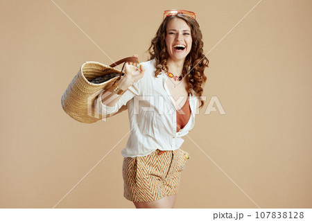 happy trendy woman in blouse and shorts happy trendy woman in blouse and shorts 107838128
