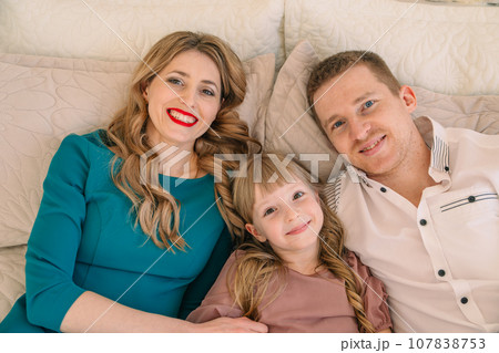happy family of three portrait happy family of three portrait 107838753