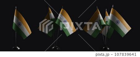 Small national flags of the India on a black background 107839641