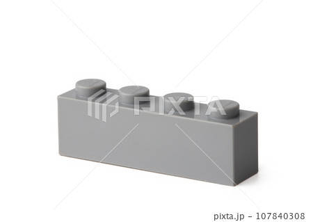 Colored plastic toy building block isolated on white Colored plastic toy building block isolated on white 107840308