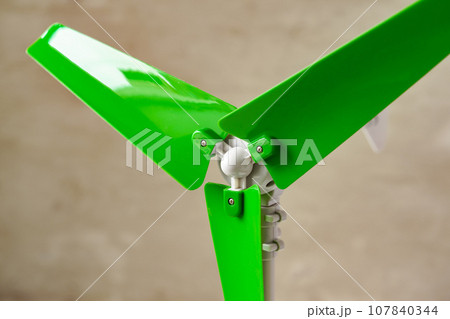 Plastic windmill model propeller indoors close up Plastic windmill model propeller indoors close up 107840344