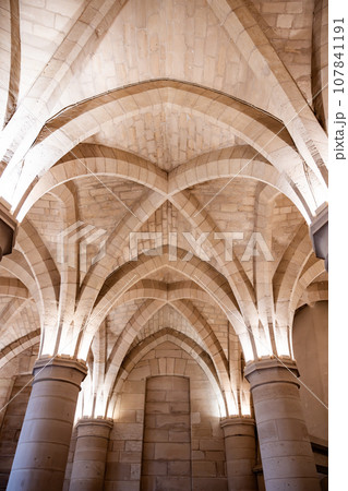Gothic ceiling of main hall in Conciergerie, former courthouse and prison in Paris, France Gothic ceiling of main hall in Conciergerie, former courthouse and prison in Paris, France 107841191