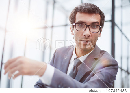 young man having online conference from home 107843488