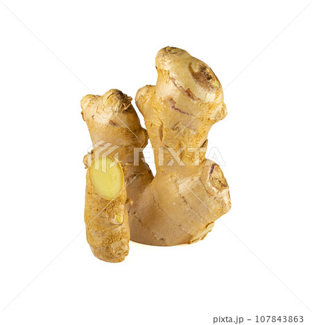 Fresh ginger rhizome with sliced isolated on white background.  107843863