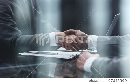 close up. handshake of business people in the office close up. handshake of business people in the office 107845390