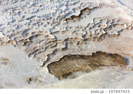 Natural travertine terraces with hot springs in Pamukkale, Turkey Natural travertine terraces with hot springs in Pamukkale, Turkey 107847433