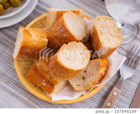 Sliced loaves of bread baguette Sliced loaves of bread baguette 107848189