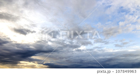 colorful dramatic sky with cloud at sunset 107849963