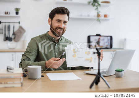 Economic expert creating new video for his business vlog 107852145