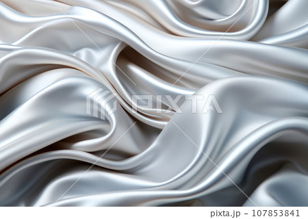 Abstract fabric background. Metallic silver fabric, pleats 107853841