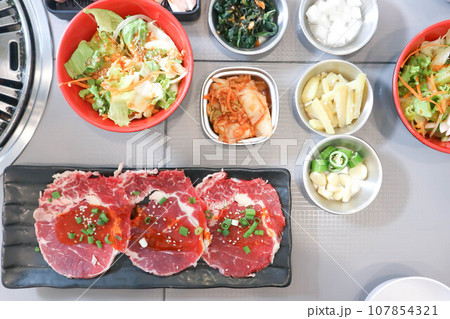 raw beef , sliced beef or beef for cook and Korean salad 107854321