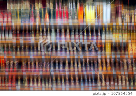 Store of alcoholic drinks blurred Store of alcoholic drinks blurred 107854354