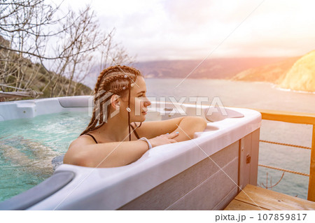 Take time for yourself. Outdoor swimsuit with mountain and sea v 107859817