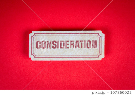 Consideration Concept. Paper sticker with text on a red background Consideration Concept. Paper sticker with text on a red background 107860023