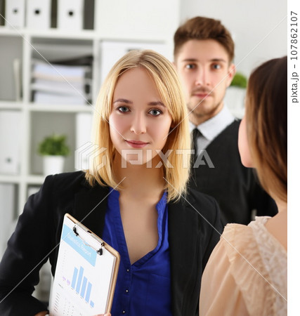 Businesspeople in stylish suits, prepare for biz meeting with client 107862107