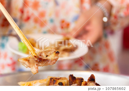 Close up of pook bbq Thai food style. shabu sukiyaki or Moo-Ka-Ta griiled pork. 107865602