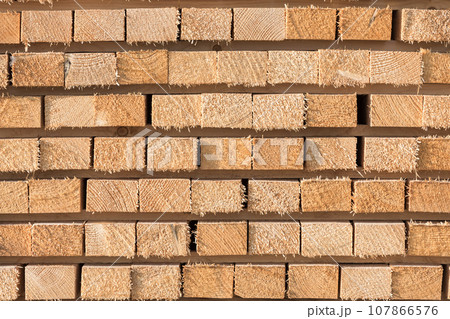 Stacked lumber background Stacked lumber background 107866576