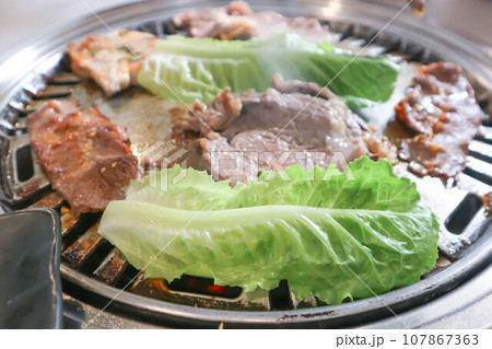 grilled pork , grilled beef and vegetable in the oven grilled pork , grilled beef and vegetable in the oven 107867363