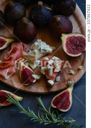 figs cheese with mold and jamon figs cheese with mold and jamon 107867822