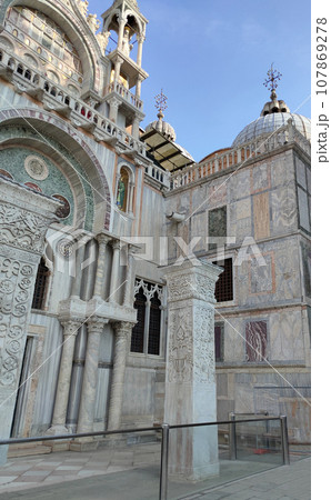 Facade of St Mark's Basilica, cathedral church of Venice, Italy. 107869278