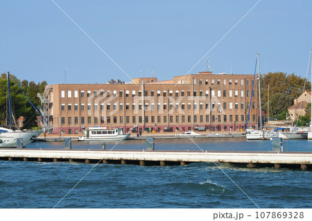 Italy, Venice. Embankment of the city, sunny summer day. Italy, Venice. Embankment of the city, sunny summer day. 107869328