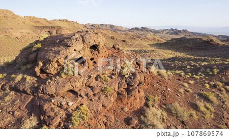 A volcanic place. Frozen old lava. Red Mountains A volcanic place. Frozen old lava. Red Mountains 107869574