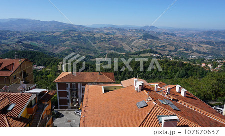 San Marino city view. Stone street and old walls in San-Marino, Italy. San Marino city view. Stone street and old walls in San-Marino, Italy. 107870637