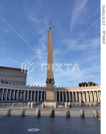 Fragment of Basilica of St. Peter in the Vatican and column on Saint Peters square in Vatican 107870642