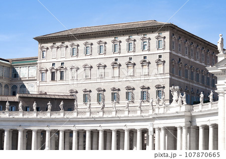 Fragment of Basilica of St. Peter in the Vatican and column on Saint Peters square in Vatican 107870665