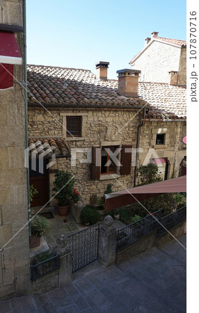 San Marino city view. Stone street and old walls in San-Marino, Italy. San Marino city view. Stone street and old walls in San-Marino, Italy. 107870716
