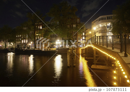 Majestic Amsterdam at night. Summer city landscape.  107873111