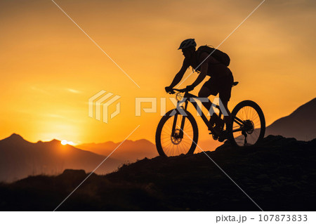 Alpine Sunrise: Mountain Biking Bliss Alpine Sunrise: Mountain Biking Bliss 107873833