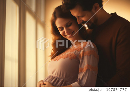 Love in Bloom: Happy Pregnant Couple Embracing Love in Bloom: Happy Pregnant Couple Embracing 107874777