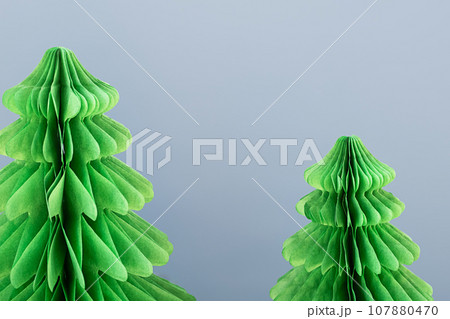 Trend paper Christmas trees. DIY alternative Christmas decoration, close up. 107880470